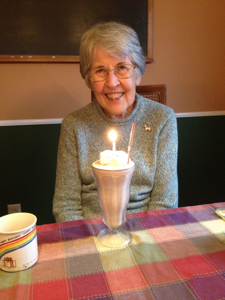 Peg and her chocolate milkshake